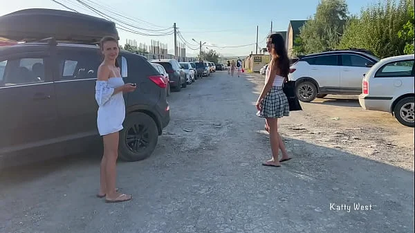 Two girls walk in public without panties and show pussies